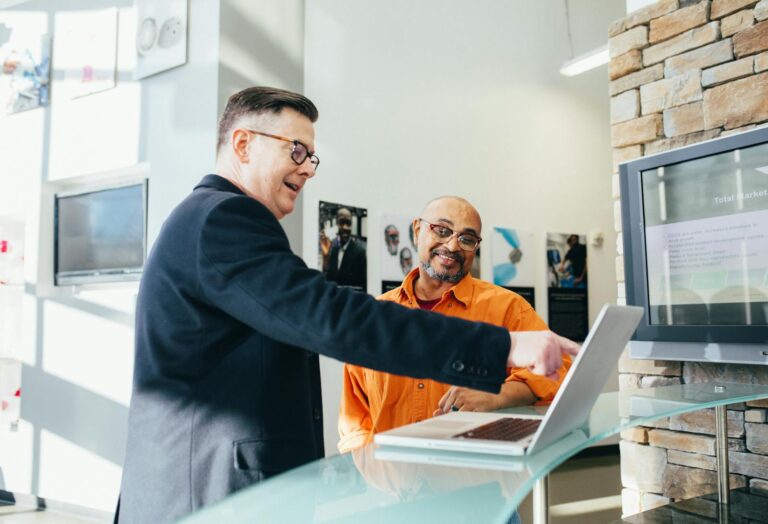 Man Pointing Laptop Computer